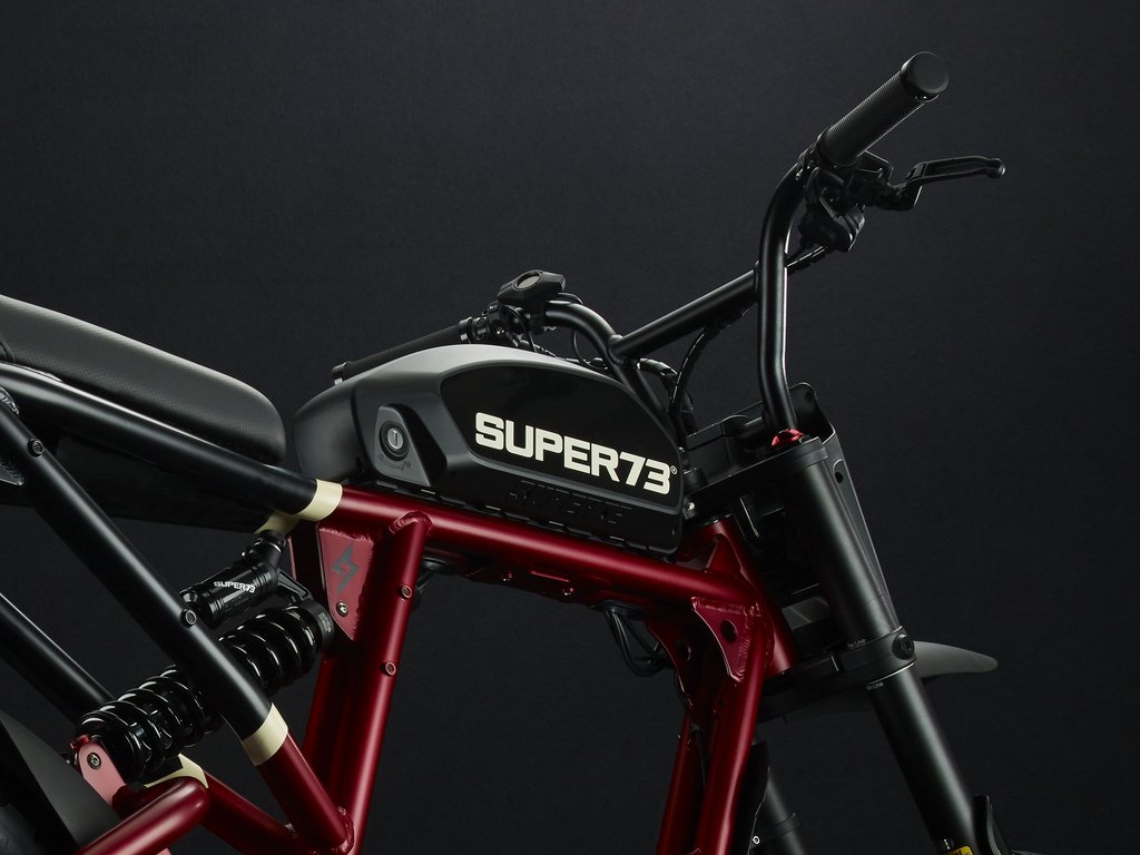 Super73-RX Carmine Red The RX debuts Super73’s most powerful and technologically advanced drive system with multi-class ride modes. This performance vehicle is a street-legal electric motorbike that does not require a license or registration. The RX also features Super73’s all-new connected electronics suite and is compatible with iOS and Android mobile devices through the new Super73 App.
