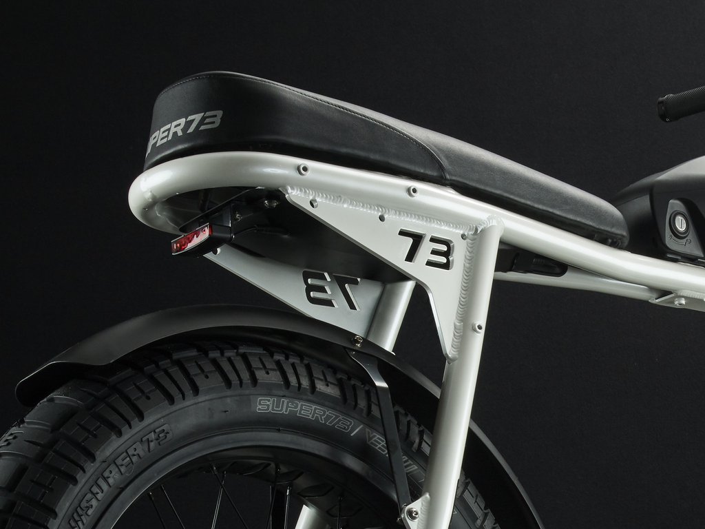 SUPER73-S2 Bone White The Super73-S2 is a high performance street-legal electric motorbike that does not require a license or registration. Designed for the urban adventurer, the agile S2 is a sport-cruiser style motorbike built with an aircraft-grade aluminum alloy frame and a fully adjustable air spring suspension fork. The S2 also features Super73's all-new connected electronics suite that is compatible with iOS and Android mobile devices through the new Super73 App.