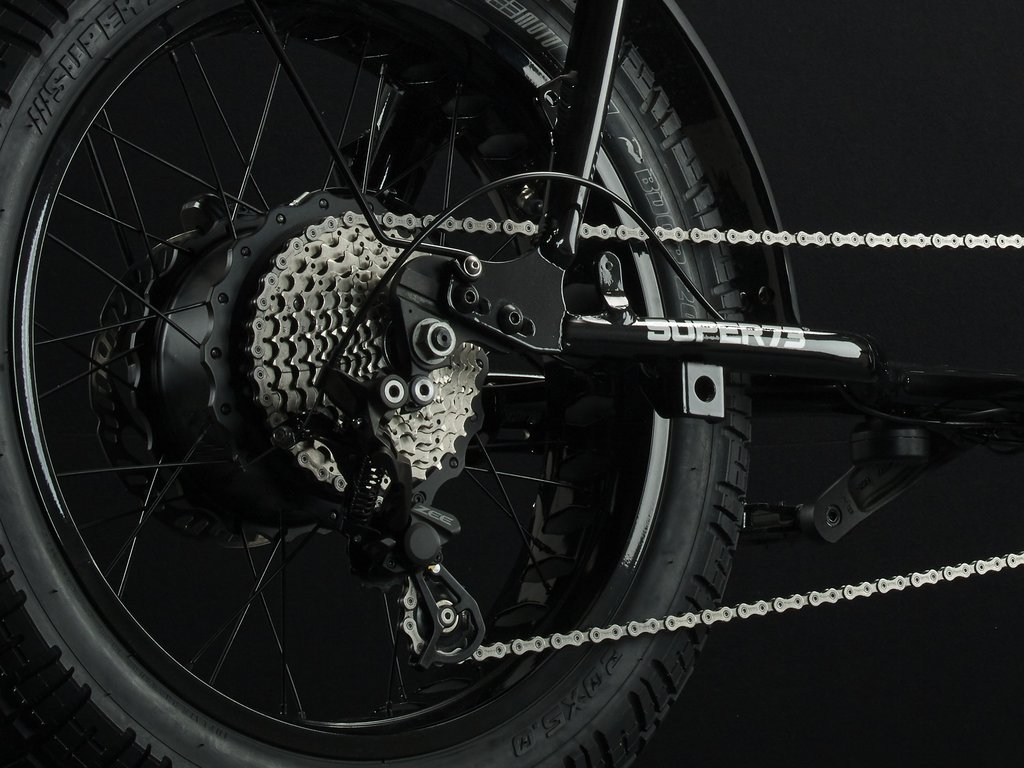 SUPER73-S2 Galaxy Black The Super73-S2 is a high performance street-legal electric motorbike that does not require a license or registration. Designed for the urban adventurer, the agile S2 is a sport-cruiser style motorbike built with an aircraft-grade aluminum alloy frame and a fully adjustable air spring suspension fork. The S2 also features Super73's all-new connected electronics suite that is compatible with iOS and Android mobile devices through the new Super73 App.