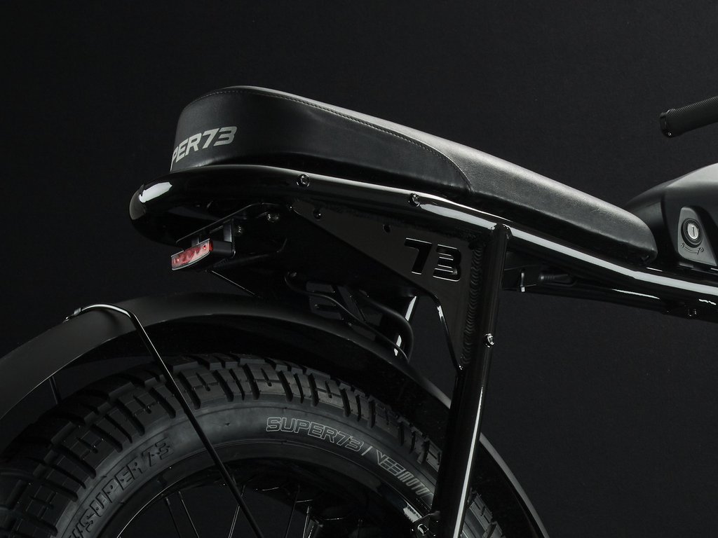 SUPER73-S2 Galaxy Black The Super73-S2 is a high performance street-legal electric motorbike that does not require a license or registration. Designed for the urban adventurer, the agile S2 is a sport-cruiser style motorbike built with an aircraft-grade aluminum alloy frame and a fully adjustable air spring suspension fork. The S2 also features Super73's all-new connected electronics suite that is compatible with iOS and Android mobile devices through the new Super73 App.