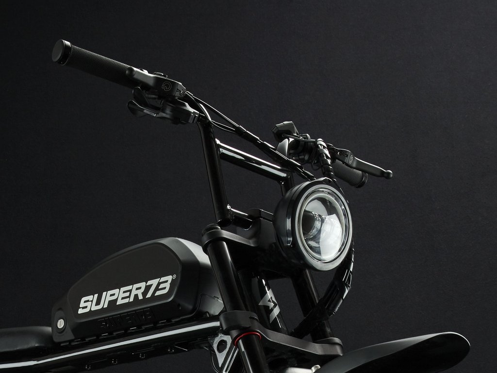SUPER73-S2 Galaxy Black The Super73-S2 is a high performance street-legal electric motorbike that does not require a license or registration. Designed for the urban adventurer, the agile S2 is a sport-cruiser style motorbike built with an aircraft-grade aluminum alloy frame and a fully adjustable air spring suspension fork. The S2 also features Super73's all-new connected electronics suite that is compatible with iOS and Android mobile devices through the new Super73 App.