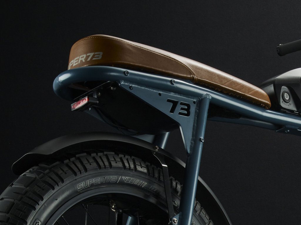 SUPER73-S2 Hudson Blue The Super73-S2 is a high performance street-legal electric motorbike that does not require a license or registration. Designed for the urban adventurer, the agile S2 is a sport-cruiser style motorbike built with an aircraft-grade aluminum alloy frame and a fully adjustable air spring suspension fork. The S2 also features Super73's all-new connected electronics suite that is compatible with iOS and Android mobile devices through the new Super73 App.