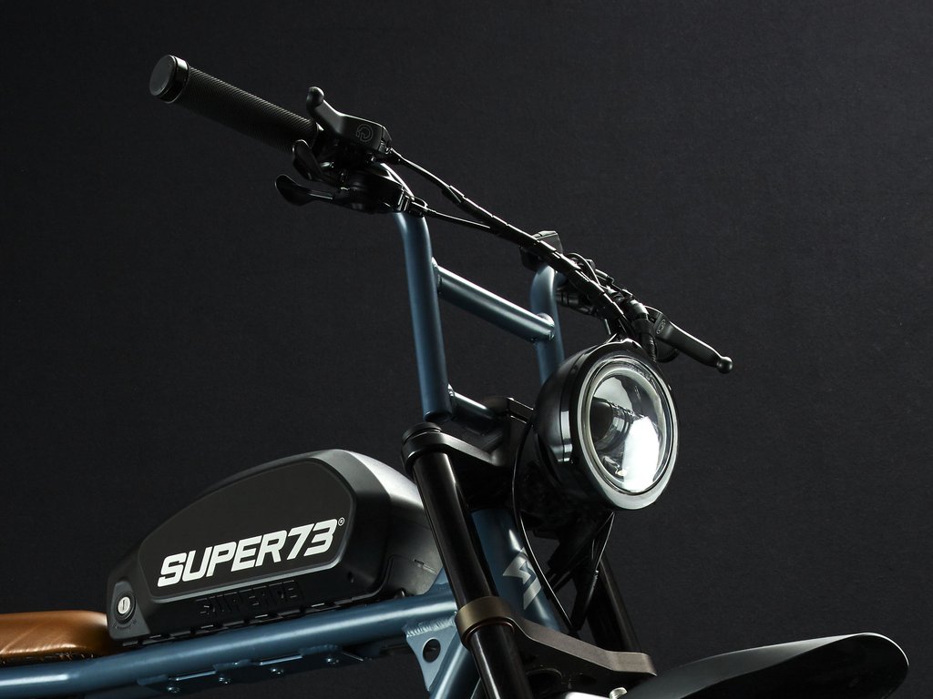 SUPER73-S2 Hudson Blue The Super73-S2 is a high performance street-legal electric motorbike that does not require a license or registration. Designed for the urban adventurer, the agile S2 is a sport-cruiser style motorbike built with an aircraft-grade aluminum alloy frame and a fully adjustable air spring suspension fork. The S2 also features Super73's all-new connected electronics suite that is compatible with iOS and Android mobile devices through the new Super73 App.