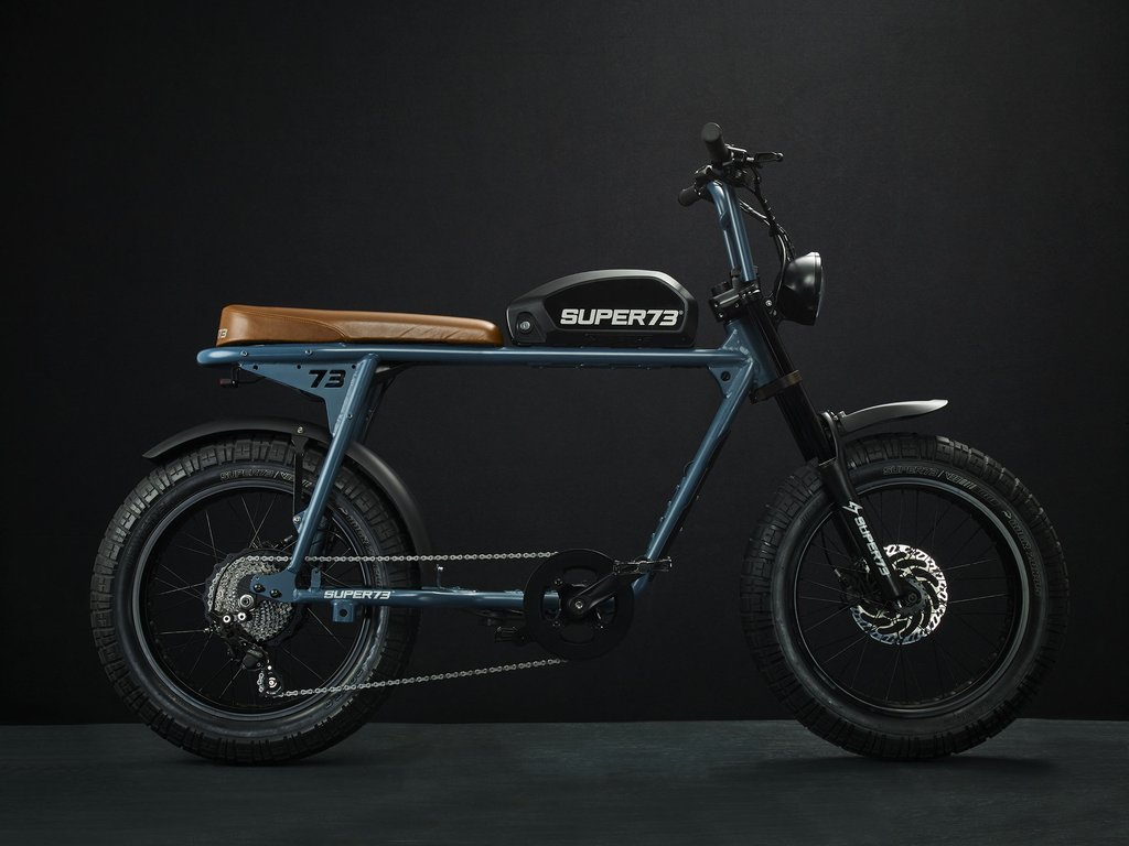 SUPER73-S2 Hudson Blue The Super73-S2 is a high performance street-legal electric motorbike that does not require a license or registration. Designed for the urban adventurer, the agile S2 is a sport-cruiser style motorbike built with an aircraft-grade aluminum alloy frame and a fully adjustable air spring suspension fork. The S2 also features Super73's all-new connected electronics suite that is compatible with iOS and Android mobile devices through the new Super73 App.
