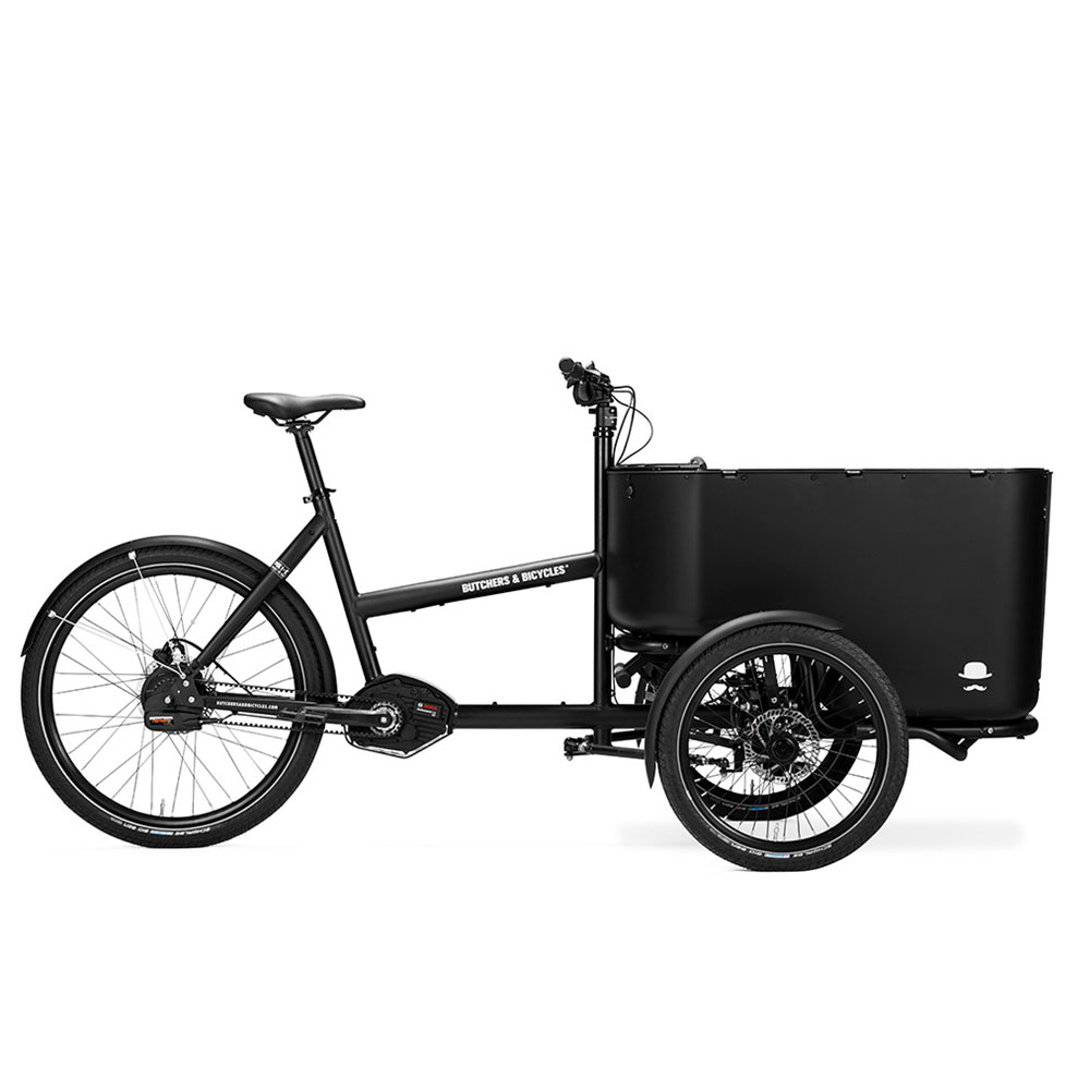 Butchers & Bicycles MK1-E Vario Butchers & Bicycles MK1-E is the ultimate family cargo bike with car-like comfort. It’s a perfect alternative to a car: avoid the hassle and downsides of riding a car in congested cities. If you are the uncompromising type, who needs an ultimate and reliable tool for your daily urban transportation, we believe the MK1-E will suit you. Combining Built To Tilt driving system with the unrivaled Bosch Performance Line eBike system, the MK1-E will make both you and your children smile every time the seat belts are buckled, no matter what weather conditions there are nor what distance you’re travelling.